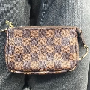 Authentic Louis Vuitton mini pochette.